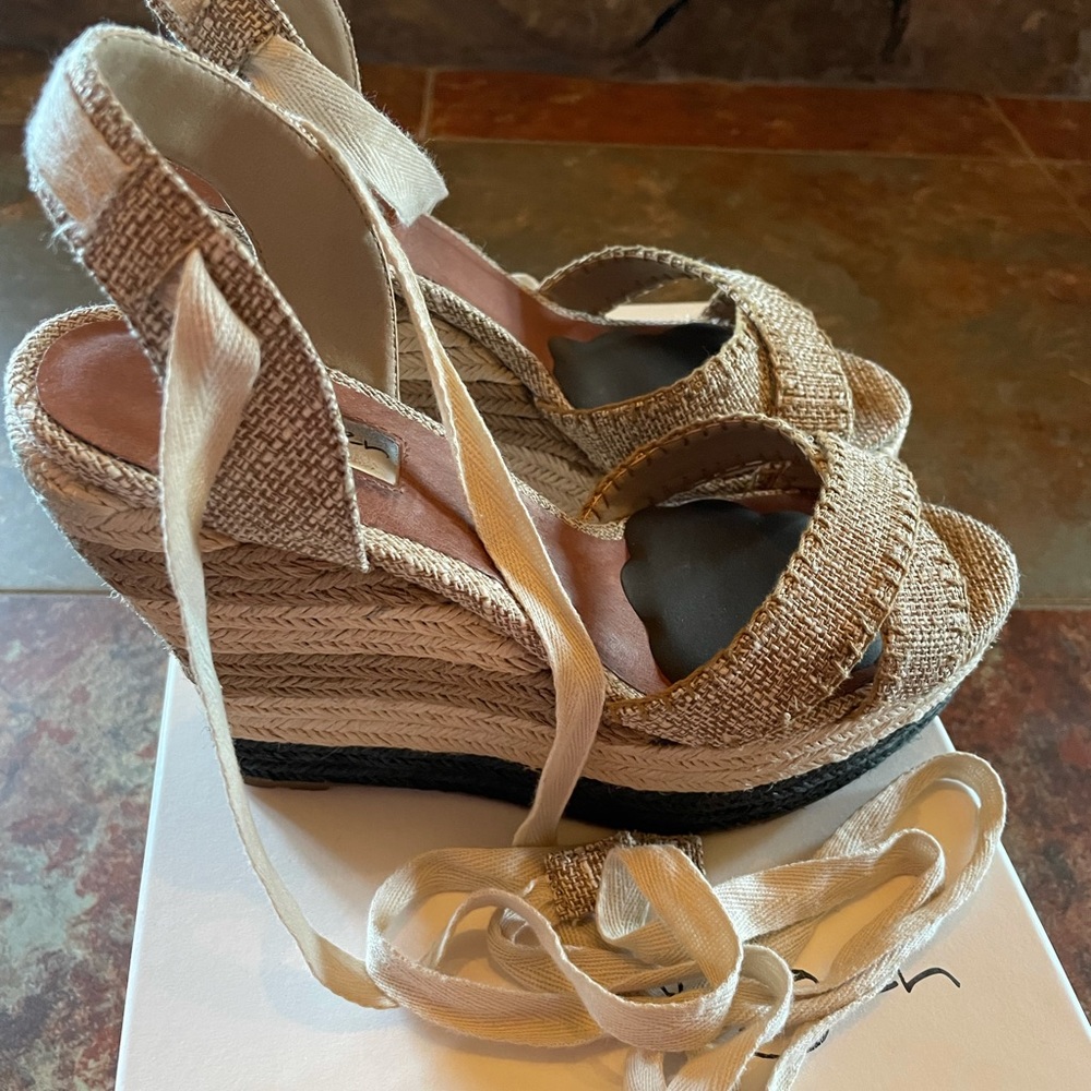 Halogen ankle tie wedges.